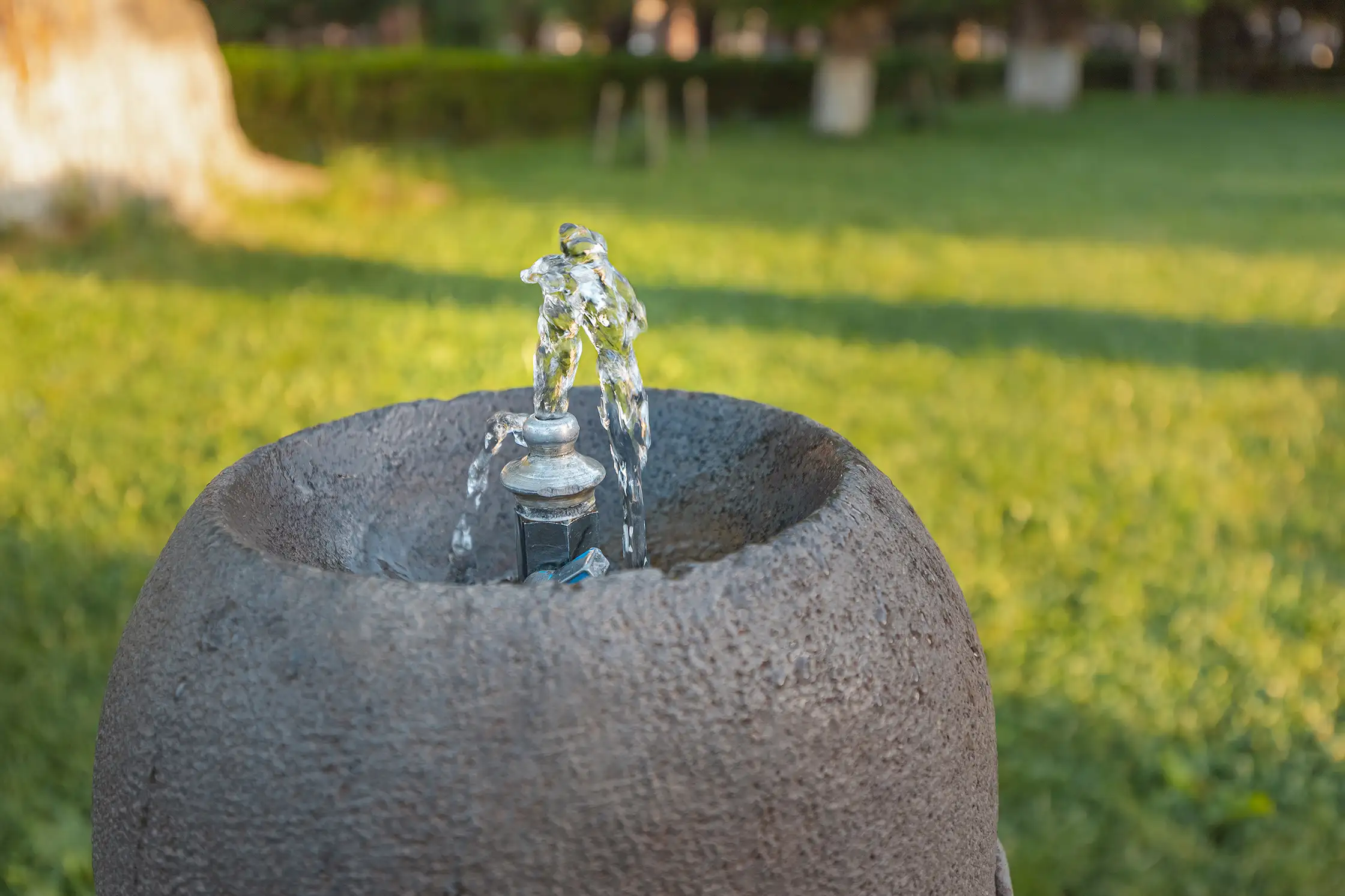 drinking fountain public park city clean water flows from tap
